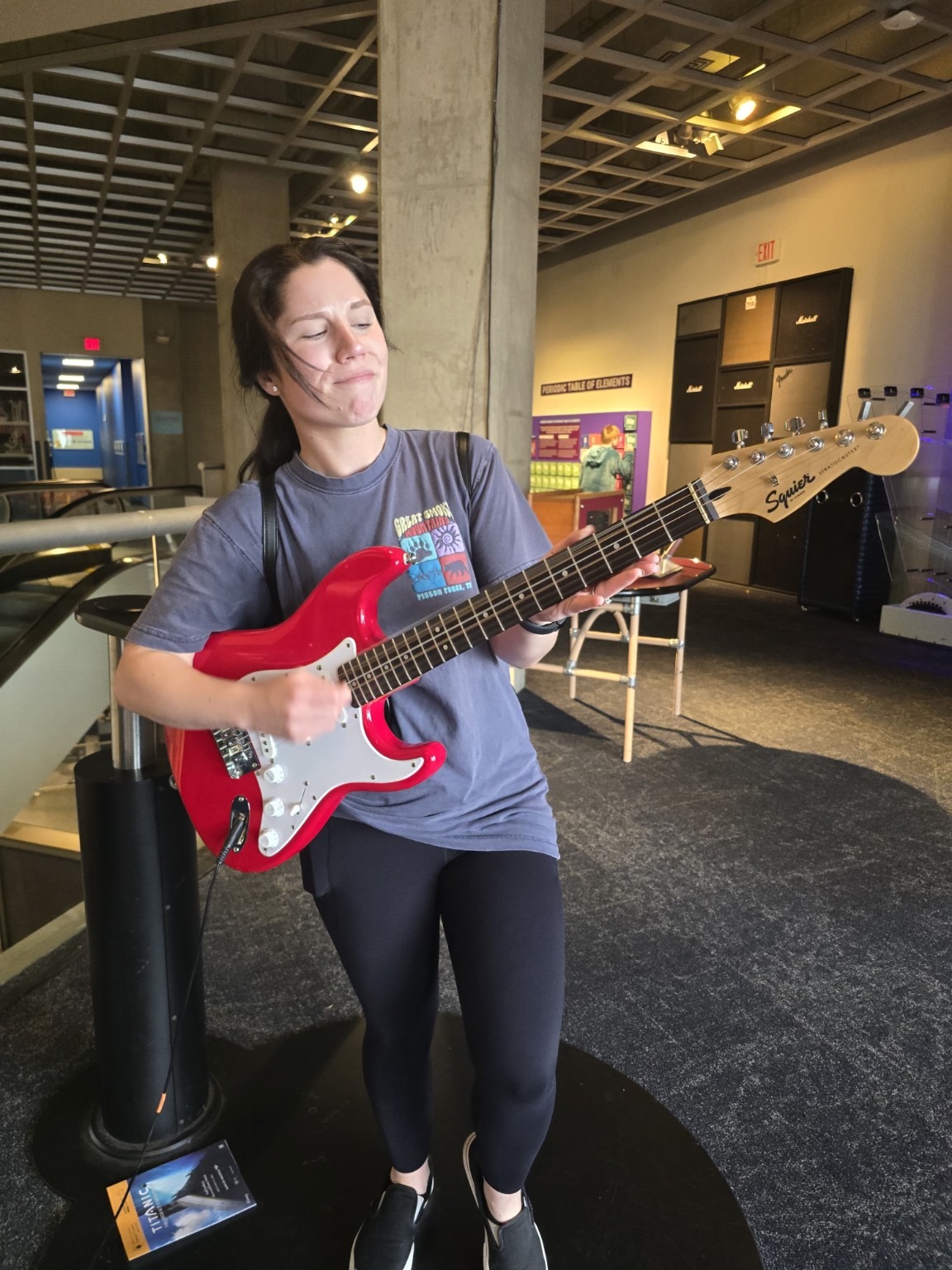 You holding a red electric guitar