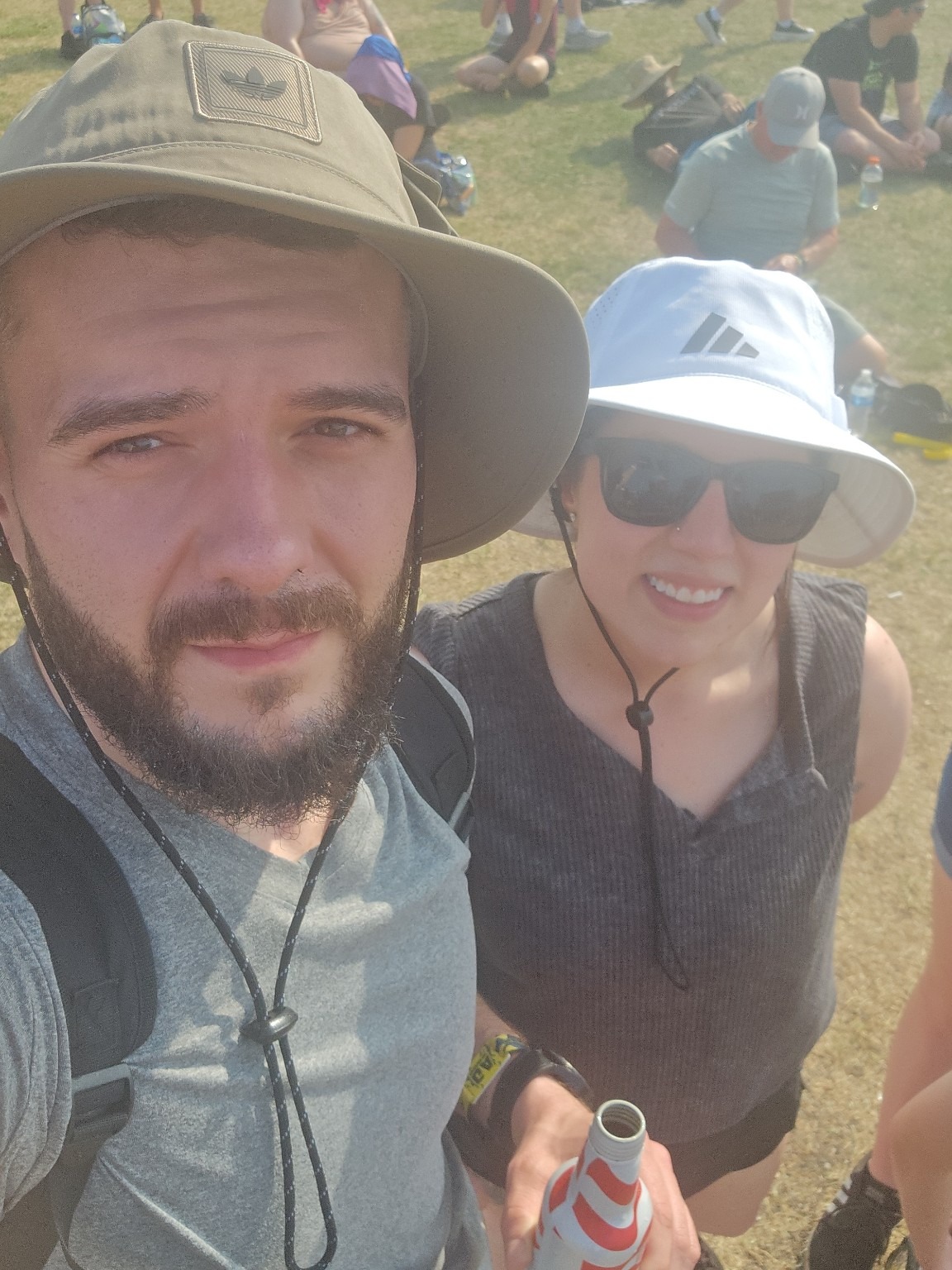 You and me wearing sun hats outdoors